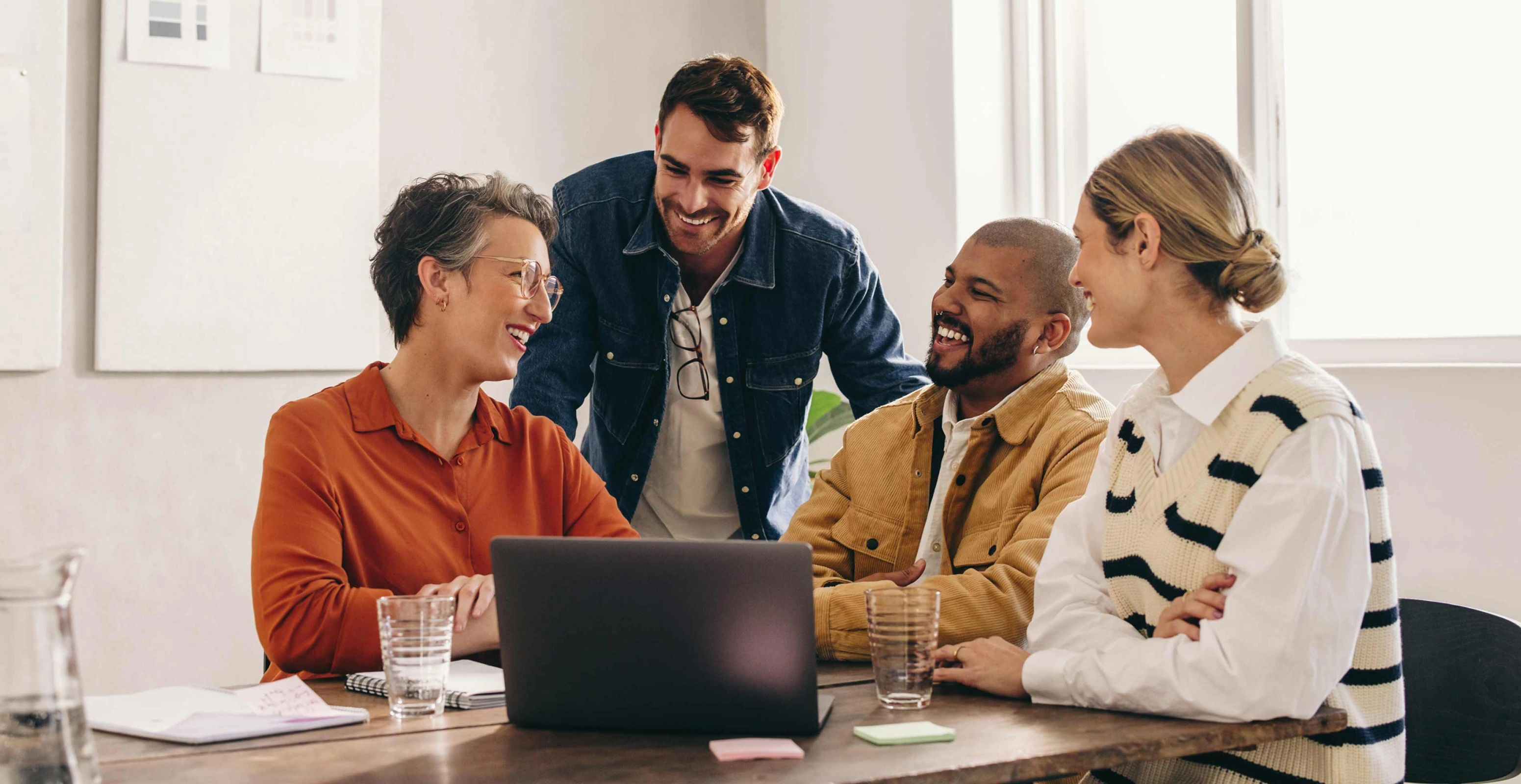 Decorative image of people smiling while looking at each other